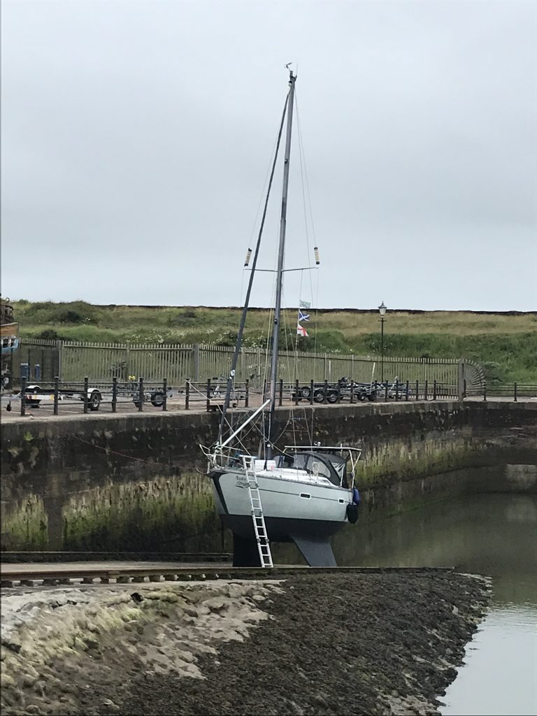 Ocean Strider dried out on the ramp at Maryport. Tidal height 35ft and above. 
