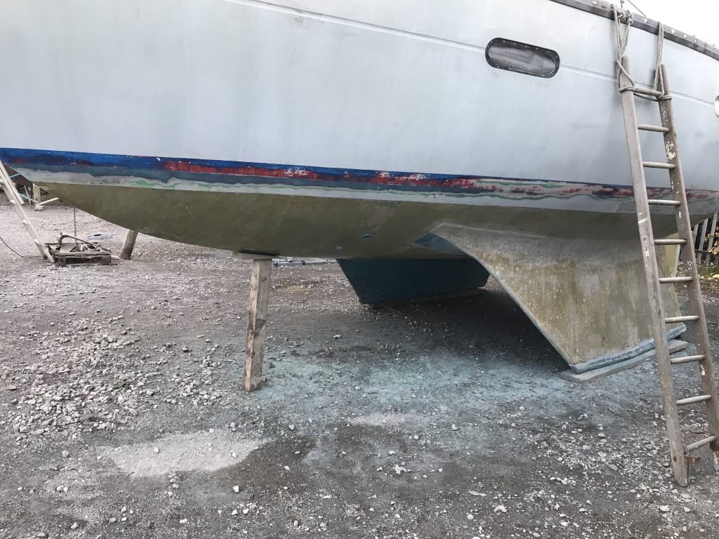 Ocean Strider in the process of her antifoul preparation.