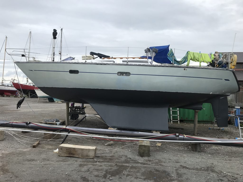 Ocean strider boat refit in progress with mast unstepped