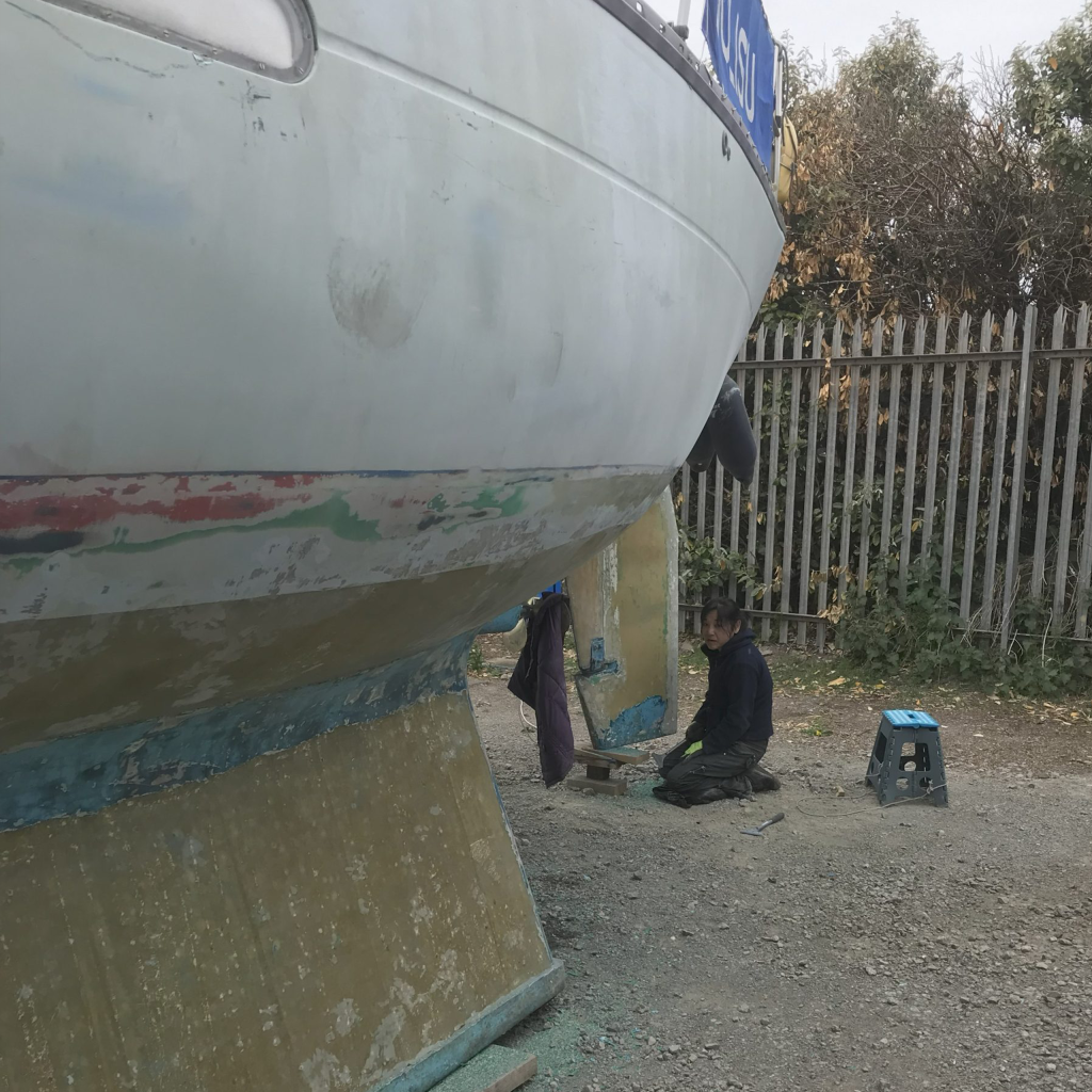 Jeanette working on the rudder on Ocean Strider.